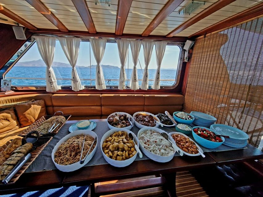 Athens: Agistri, Metopi & Aegina Cruise with Meals & Drinks - Lunch on the Yacht: Greek Buffet, Moussakas-Style Comfort, and Unlimited Drinks