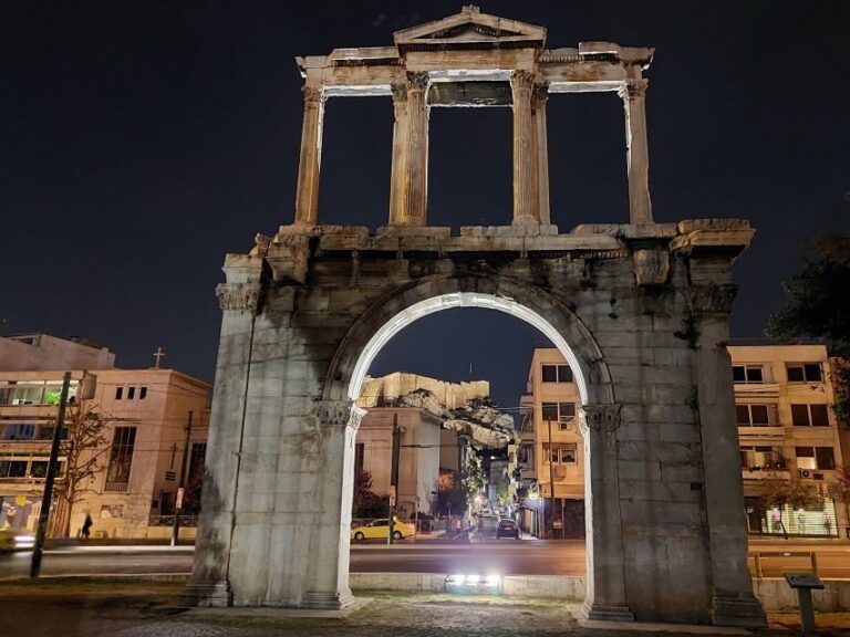Athens: City Highlights Nighttime Walking Tour in Spanish - The neoclassical trio: National Library, University, and the Academy of Athens