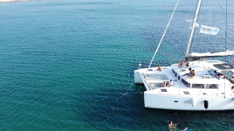 Athens: Half-Day Morning Catamaran Cruise with Meal & Drinks - Vouliagmeni Bay: Lunch, Wine, and Snorkel-Ready Coves