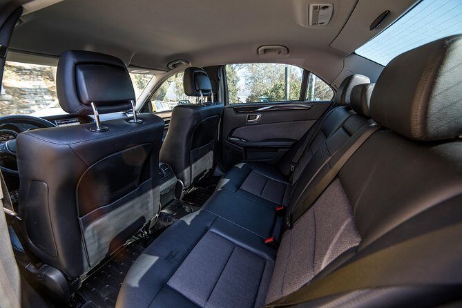 Athens hotels to Athens airport Private departure transfer - Optional history chat: what you get without an official guide
