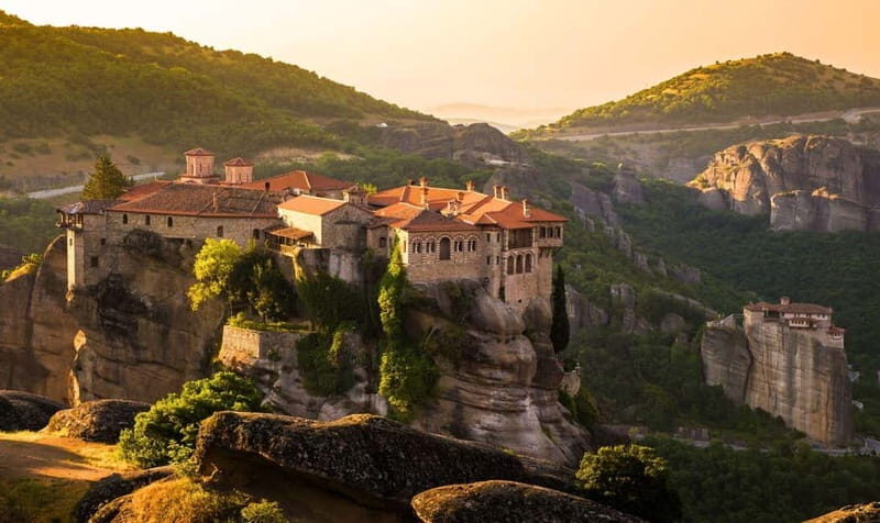 Athens: Meteora Tour with Local Guide and Greek Lunch - Hermit Caves and the St. George Mandilas Connection