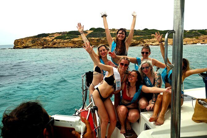 Athens Riviera Catamaran tour with fresh Meal Drinks and Swimming - Vouliagmeni Bay first swim stop: clear water and easy entry