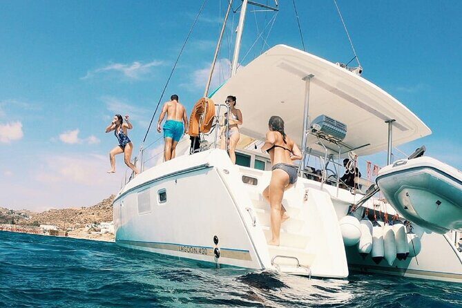 Sail the Athenian Coastline on a Catamaran with Meal & Wine - Stop 2: Vouliagmeni Bay for the classic Riviera feel