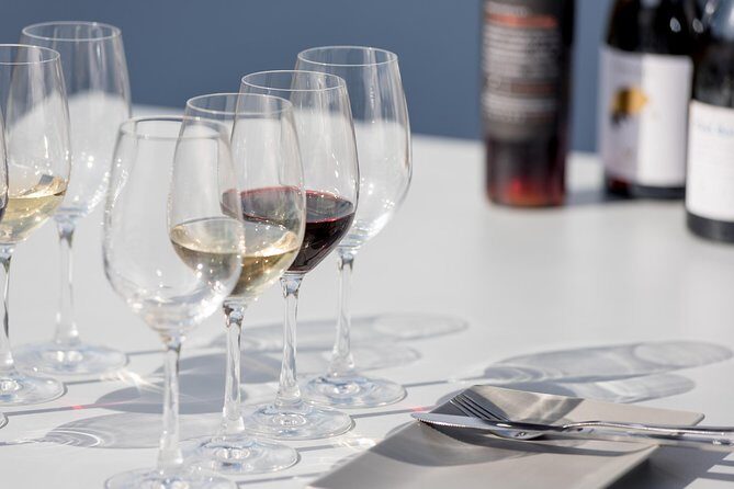 Santorini Wine Roads Tour with Wine Tastings Morning & Sunset - Pick-up, ride comfort, and how the day actually moves